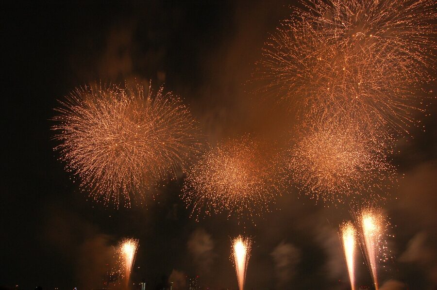 Crowd watching Adachi Fireworks from the Arakawa riverbank