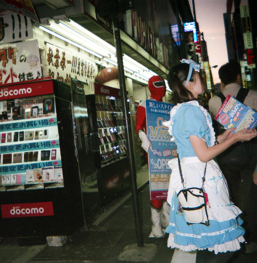 Maid cafe waitress on Akihabara street