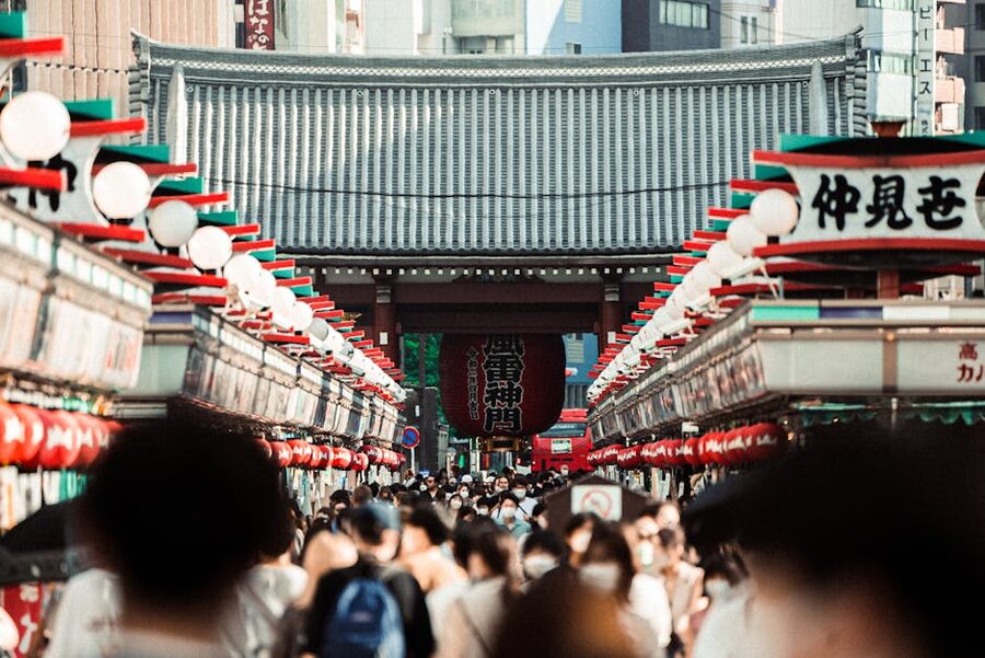 Crowd on Nakamise shopping street leading to Sensoji Temple
