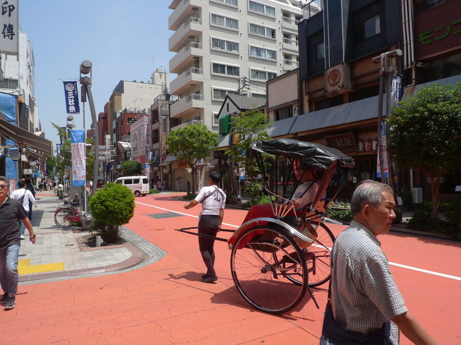 Traditional rickshaw (jinrikisha) in Asakusa streets