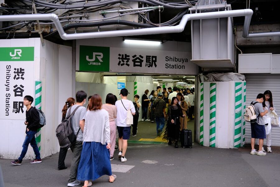 Pedestrians at Shibuya Station in Tokyo