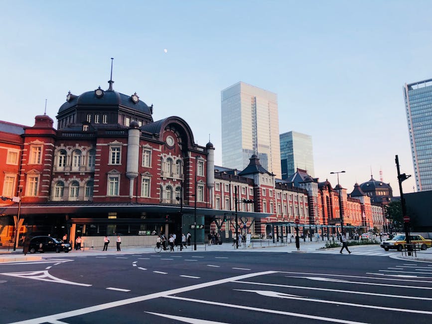 Tokyo Station exterior at dusk, the hub for business hotels