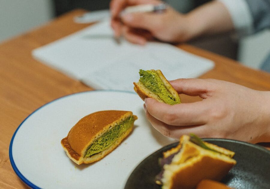 A Japanese dorayaki with matcha and red bean filling