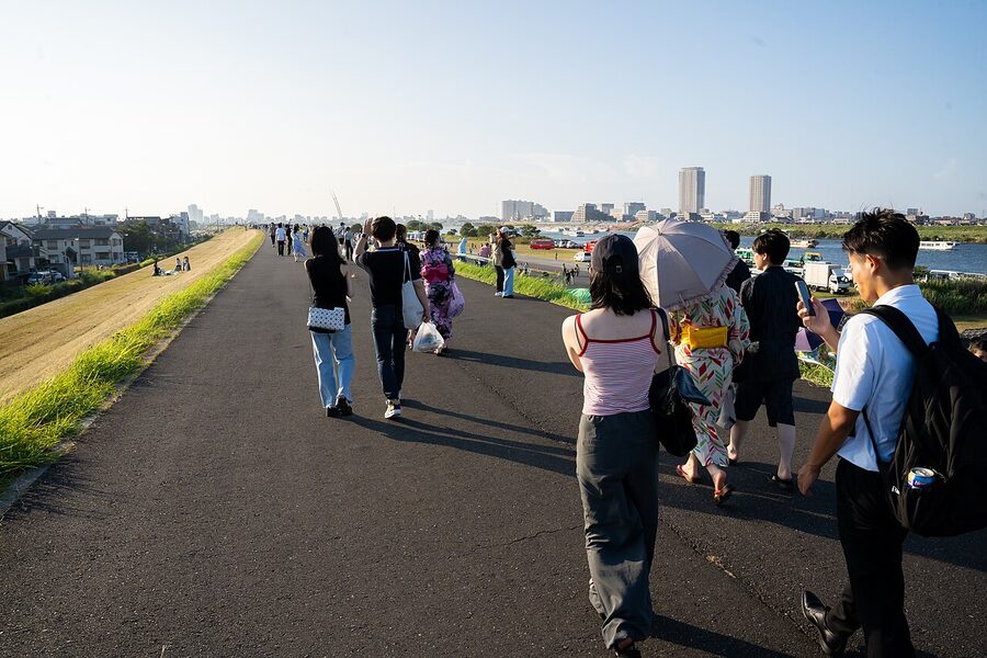Crowd watching fireworks from Edogawa riverbank