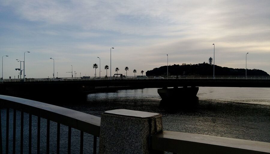 Enoshima silhouette at sunset from Katase Beach
