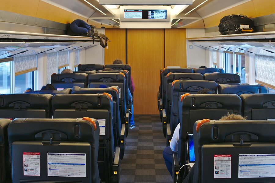 Interior of the Narita Express showing green class reclining seats