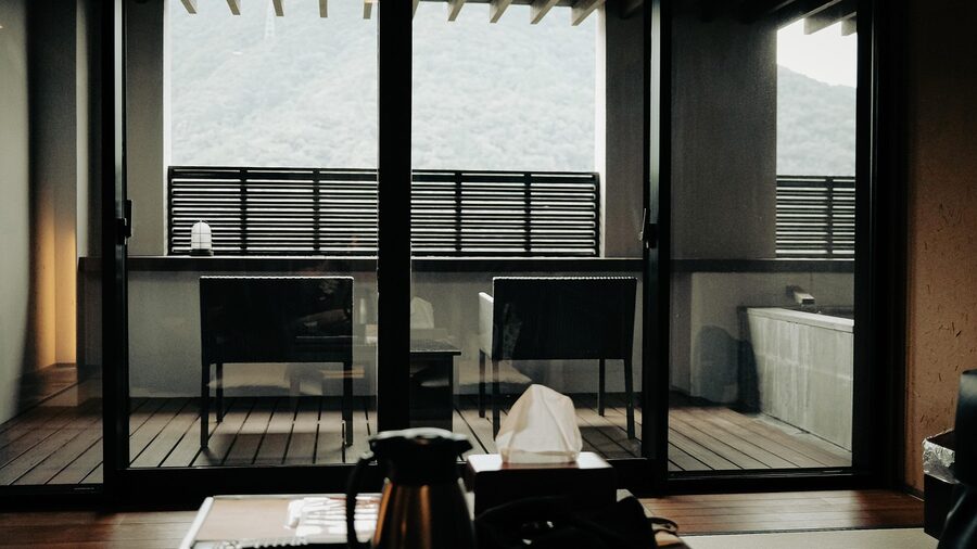 Traditional Japanese ryokan interior with tatami and futon at Hakone