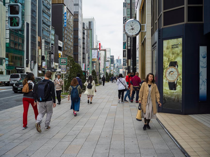 Shopping district pedestrians on Omotesando Tokyo