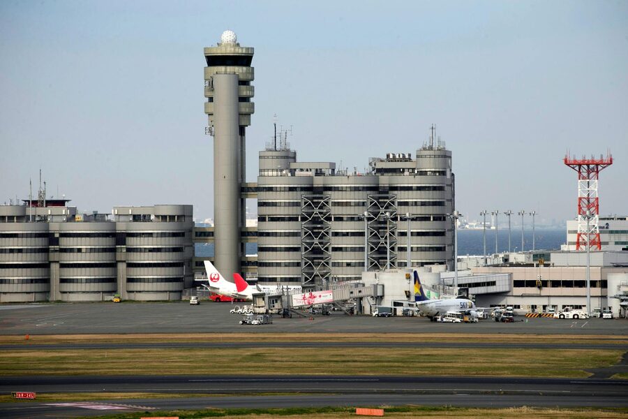 Haneda Airport aerial view with multiple terminals and runways