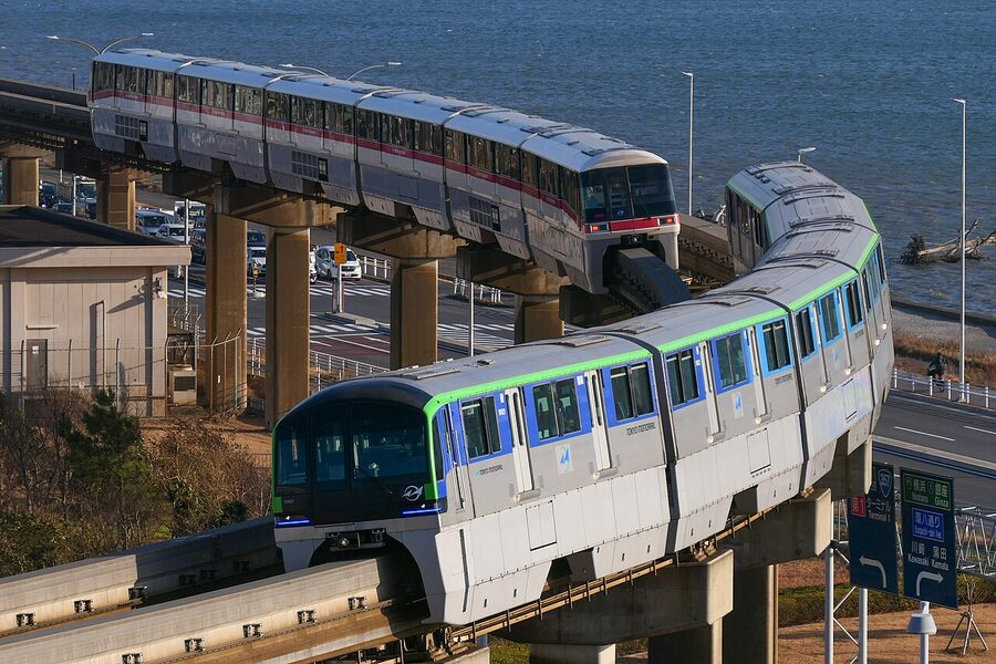 Tokyo Monorail trains with distinctive blue and white livery