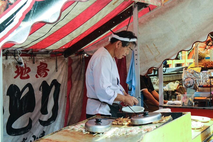 Japanese yatai food stall serving festival food at an outdoor event