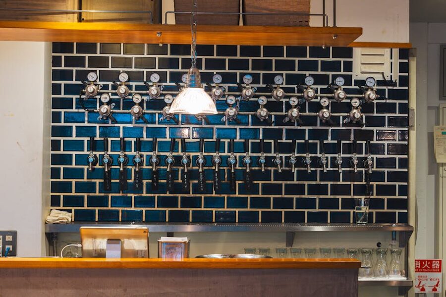 Craft beer taps at a Tokyo bar with multiple pour options