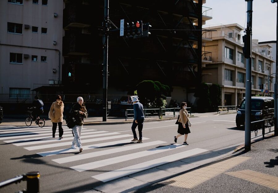 People waiting at a pedestrian crossing in Tokyo