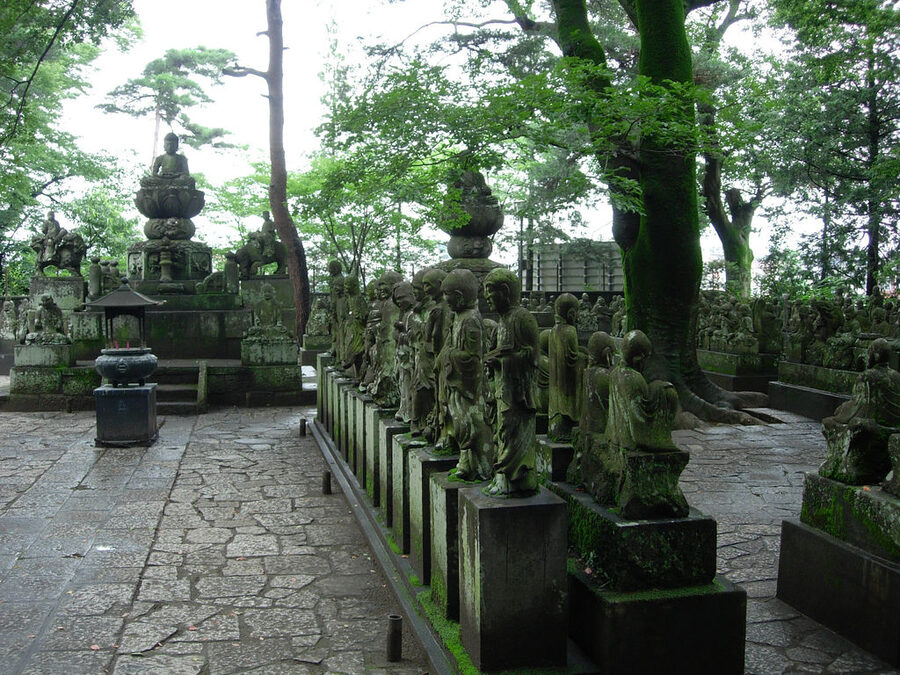Rows of 500 Rakan stone Buddhist disciple statues at Kitain Kawagoe each with different expression