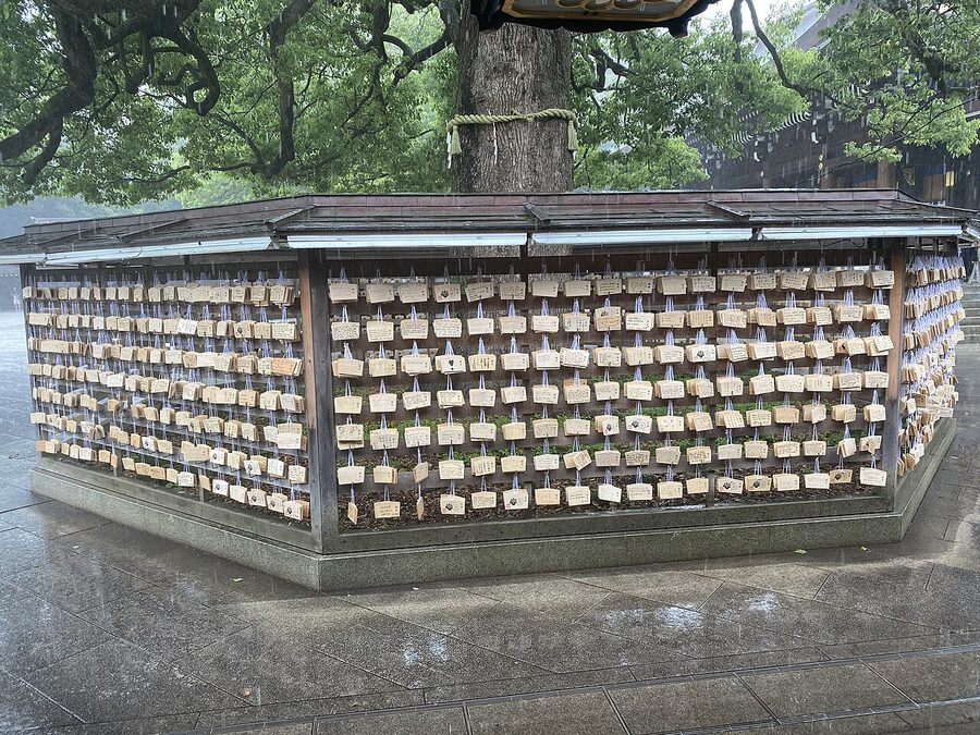 Ema wooden prayer plaques hanging at Meiji Jingu