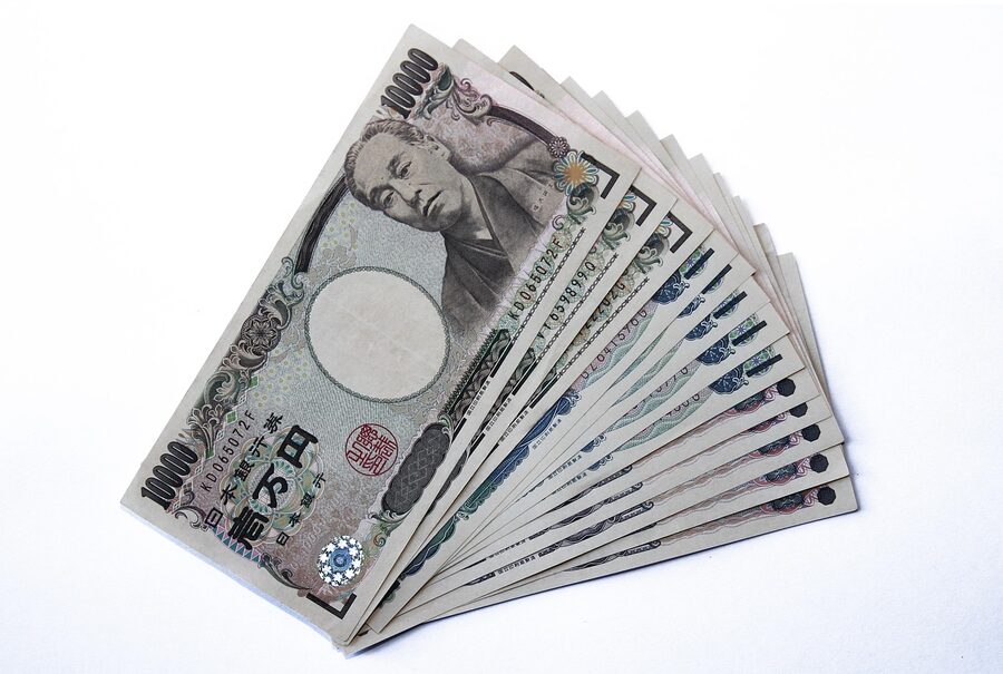 Japanese yen notes fanned out on a table