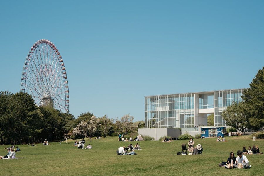 Odaiba Seaside Park with ferris wheel and beach on a sunny day