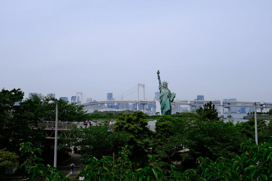 Odaiba Statue of Liberty replica with Rainbow Bridge and Tokyo skyline