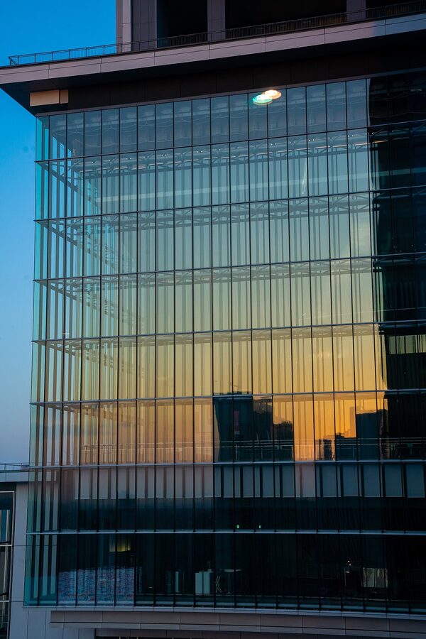 Shibuya Sky open-air rooftop observation deck at sunset with visitors looking out over Tokyo