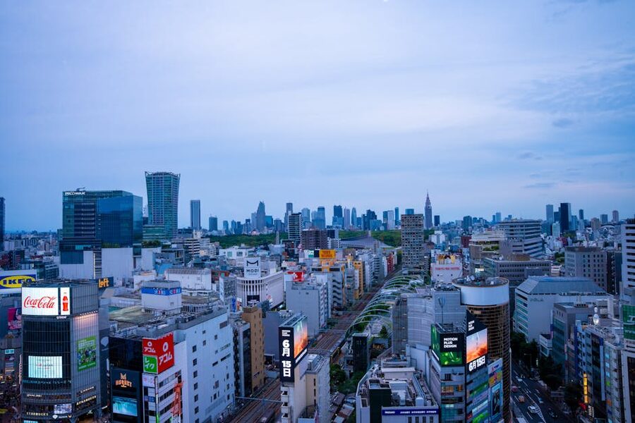 Shibuya skyline at dusk with city lights and office towers, Tokyo