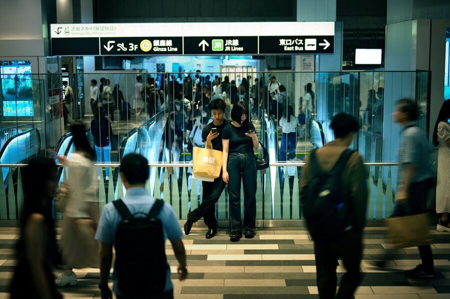 Shinjuku Station commuters and escalators