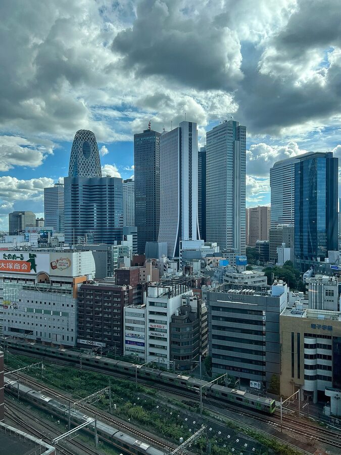 Shinjuku Station west side skyscrapers with Yamanote line passing
