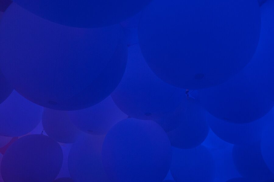 Koi fish projection on water at teamLab Planets Drawing on the Water Surface