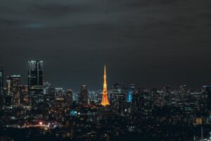 Tokyo Tower glowing orange against the night skyline of central Tokyo