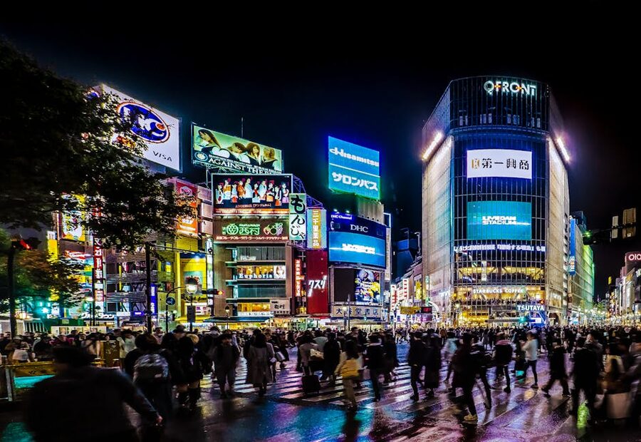 Crowds crossing the Shibuya scramble at night