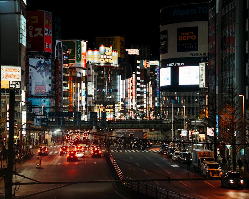 Neon signs and crowds on a Shinjuku backstreet at night