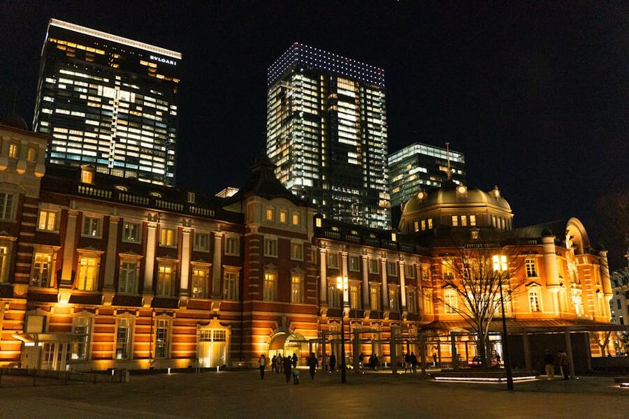 Red-brick Marunouchi facade of Tokyo Station lit up at night