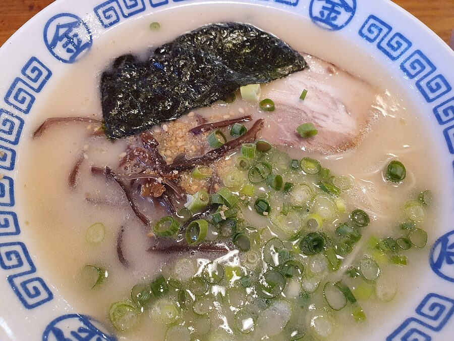 Cloudy white tonkotsu pork bone ramen bowl in Tokyo