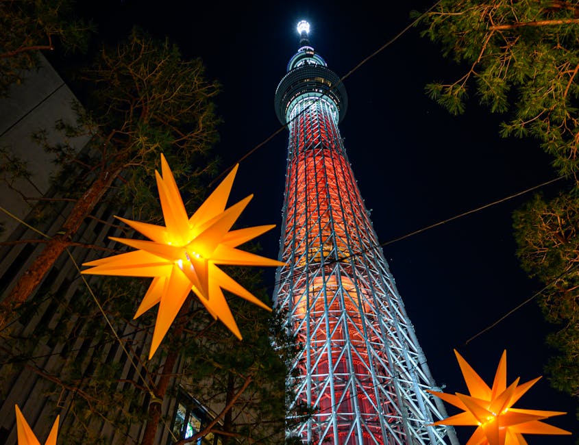 Tokyo Skytree illuminated at night over Sumida