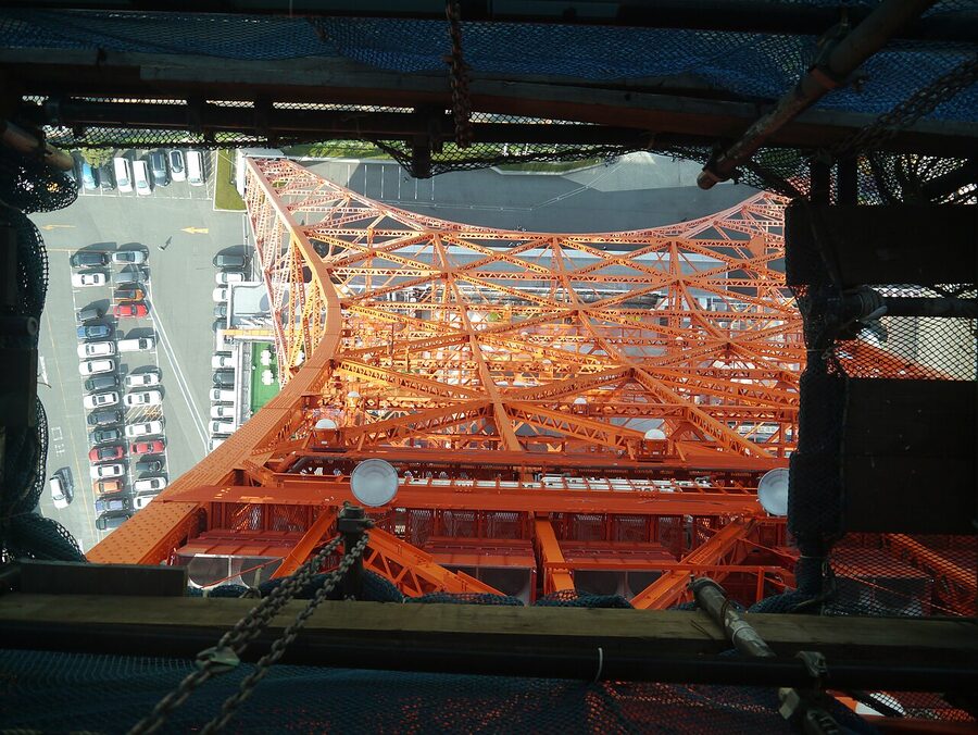 View straight down through the Main Deck glass floor showing the ground 145 metres below