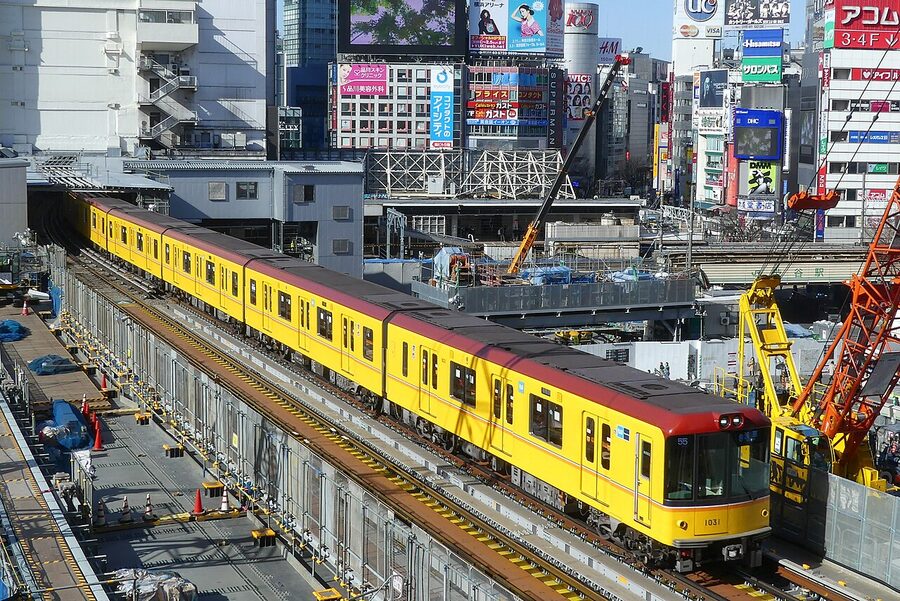 Ginza Line train running above street level near Shibuya