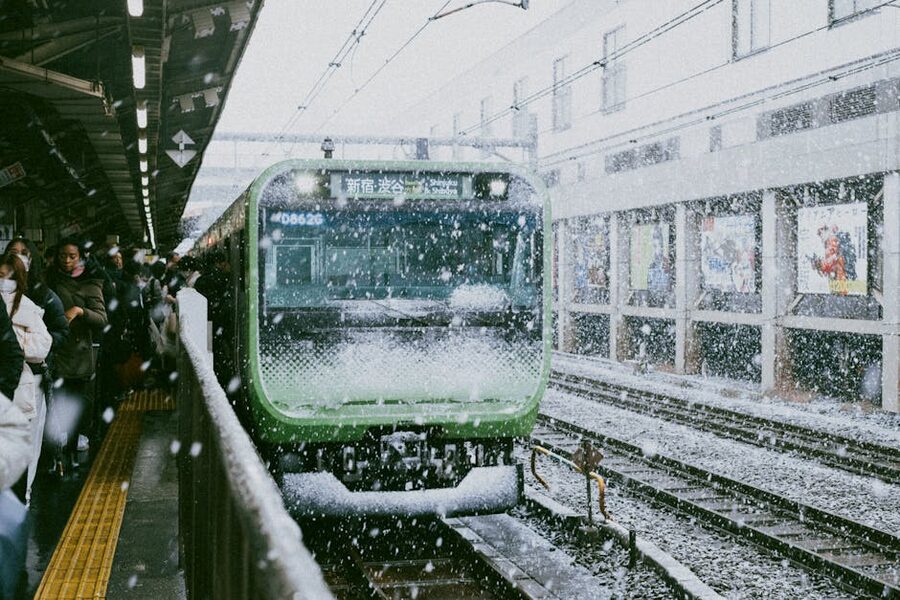 Shinjuku Station platform during a snowfall