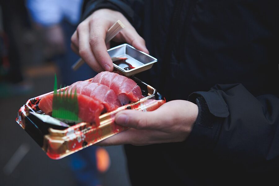 Plate of sashimi with tuna and salmon at Tsukiji Market, Tokyo