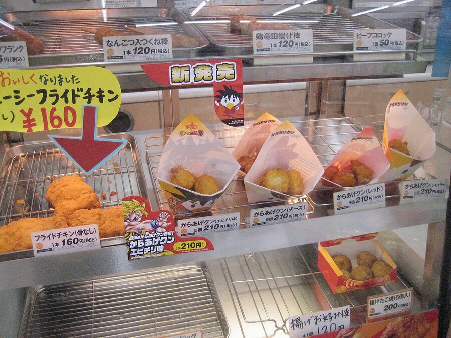 Hot food counter with fried chicken and snacks at a Lawson