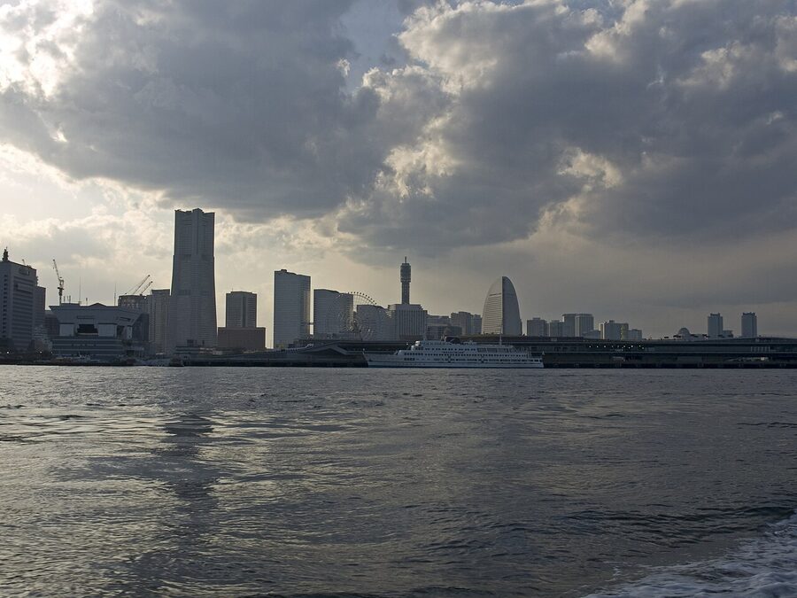 Yokohama Landmark Tower from the water, with surrounding waterfront buildings