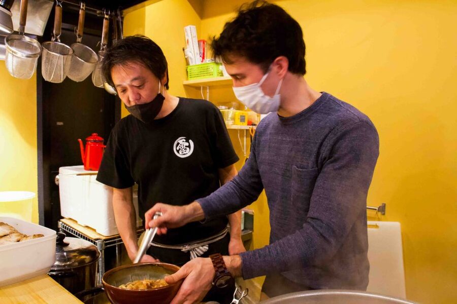 Exclusive Tokyo Ramen Kitchen Experience - Putting together two small ramen bowls