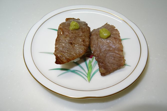 Experience all of Japanese culture and Japanese food experience classes "origami, udon, Japanese food, green tea, calligraphy" in 4 hours - Sushi, gyoza, and tempura for lunch