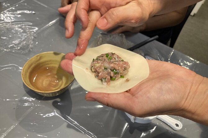Gyoza Making from Scratch- Tokyo Ultimate Cooking Class - Pan-frying yaki-gyoza and building the meal
