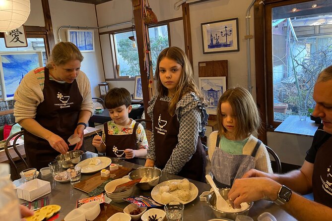 Make Rice Balls and Enjoy a Japanese Home-Style Lunch in Yanaka - Sitting down for lunch and miso soup