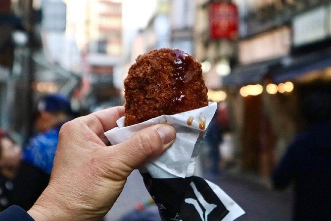 Private Tokyo Food Tour with 10+ Tastings of Japanese Classics - A Buddhist temple and a quieter pause