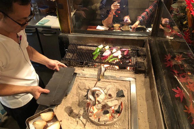 Sangenjaya Back Alleys Private Food and Drink Tour - Stop three: seafood and traditional sake
