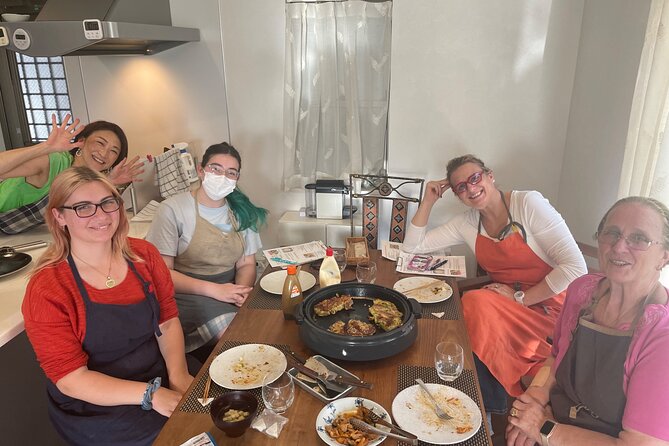 Small-Group Osaka-Style Okonomiyaki Cooking Class - Choosing fillings and learning the flip