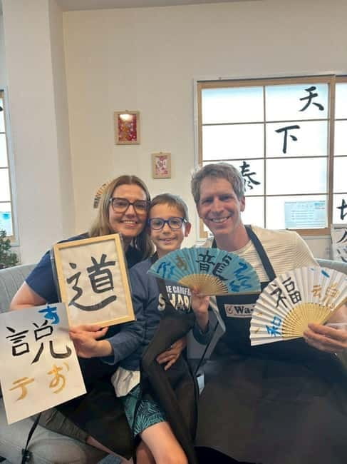 Tokyo:Calligraphy &Make your original folding fan in Asakusa - Melting solid ink and preparing the brush