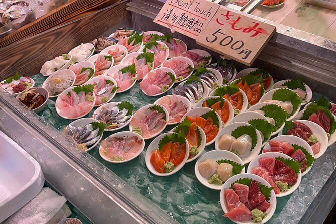 Tokyo:Enjoy street food & Japanese food culture at Tsukiji Market - Starting at Tsukiji Hongwanji Temple
