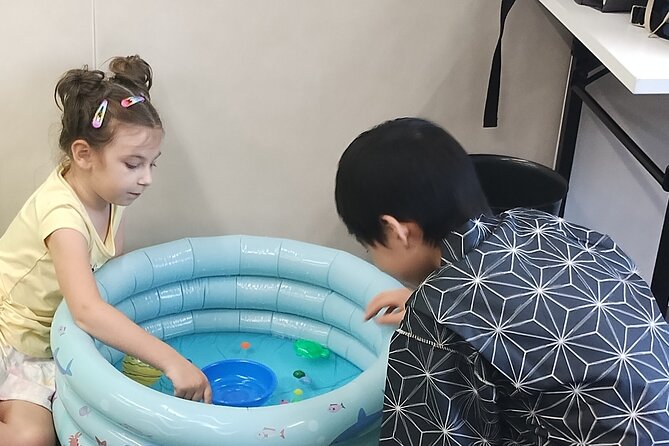 Tokyo Family Culture Workshop: Calligraphy, Origami &Yukata Photo - Yukata fitting and photos with your artwork