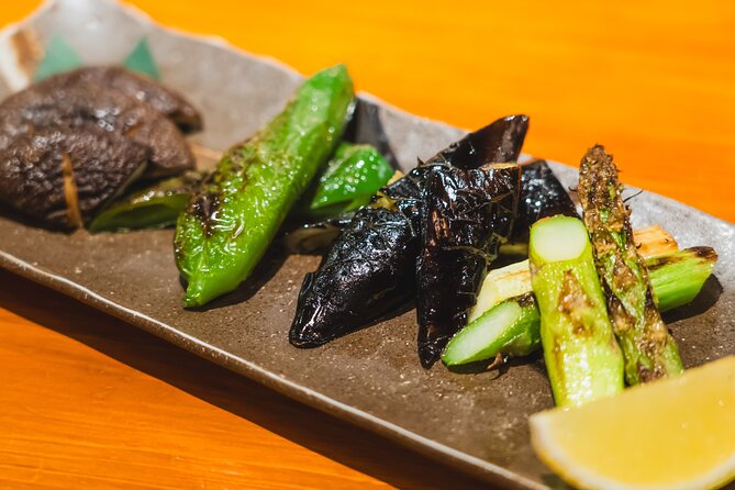 Tokyo Ginza Authentic Food Tour (Izakaya Hopping by local guide) - Second stop in Ginza: Wagyu barbecue